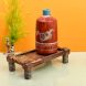 Rustic Red Madhubani Vase placed on Ethnic Charpai Stand (12.5x7x12.5)
