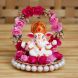 eCraftIndia Lord Ganesha Idol on Decorative Handcrafted Plate with Throne of Pink and Red Flowers (MSGG611)