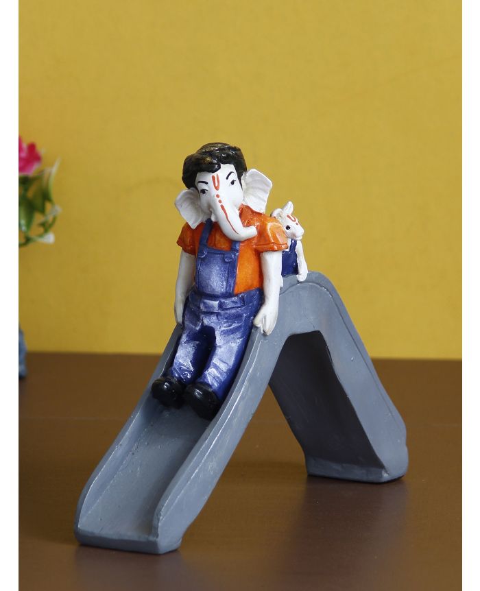eCraftIndia Lord Ganesha Enjoying Slide with Mushak Colorful Handcrafted  Decorative Figurine (MSGG652)